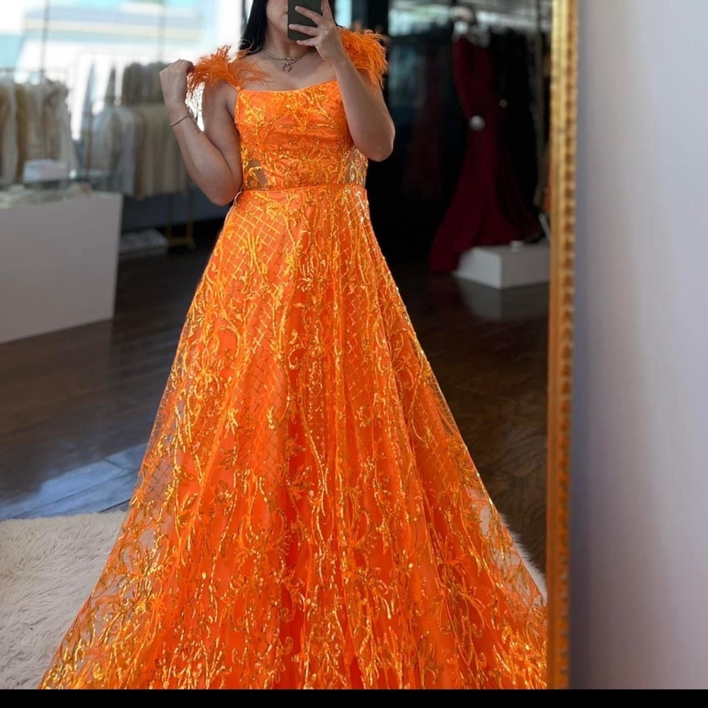 NEON ORANGE BALL GOWN WITH FEATHERS